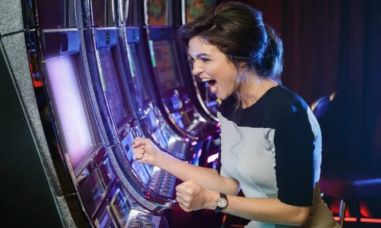 slot win casino winner woman cash prize