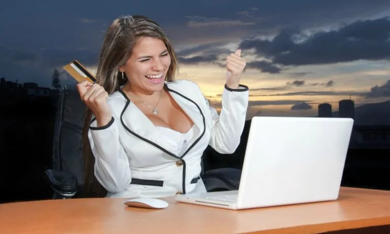 woman laptop win joy vip gold level