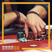 Placing poker chips on the table